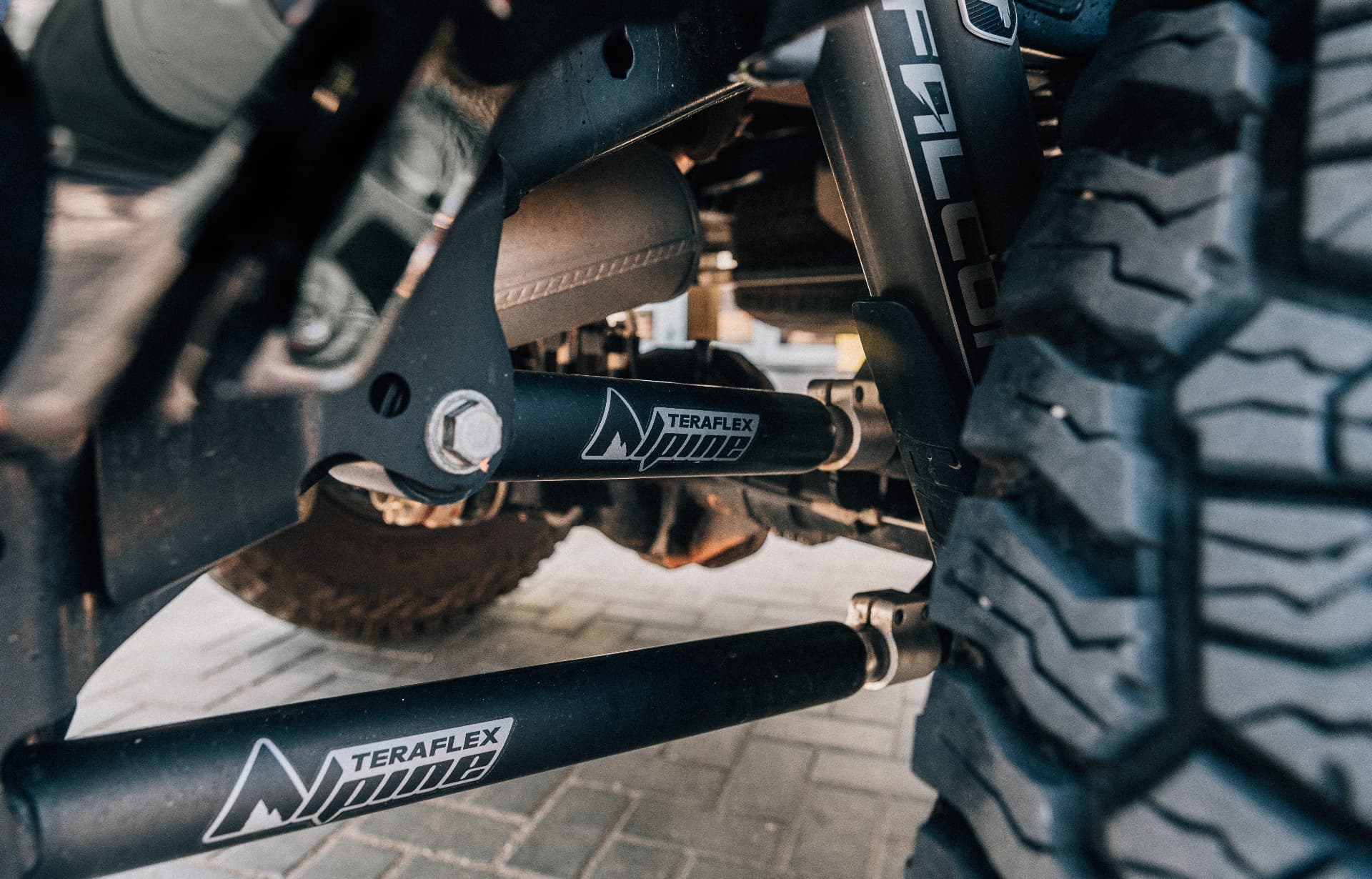 TeraFlex Alpine control arms and skid plates under The Beast