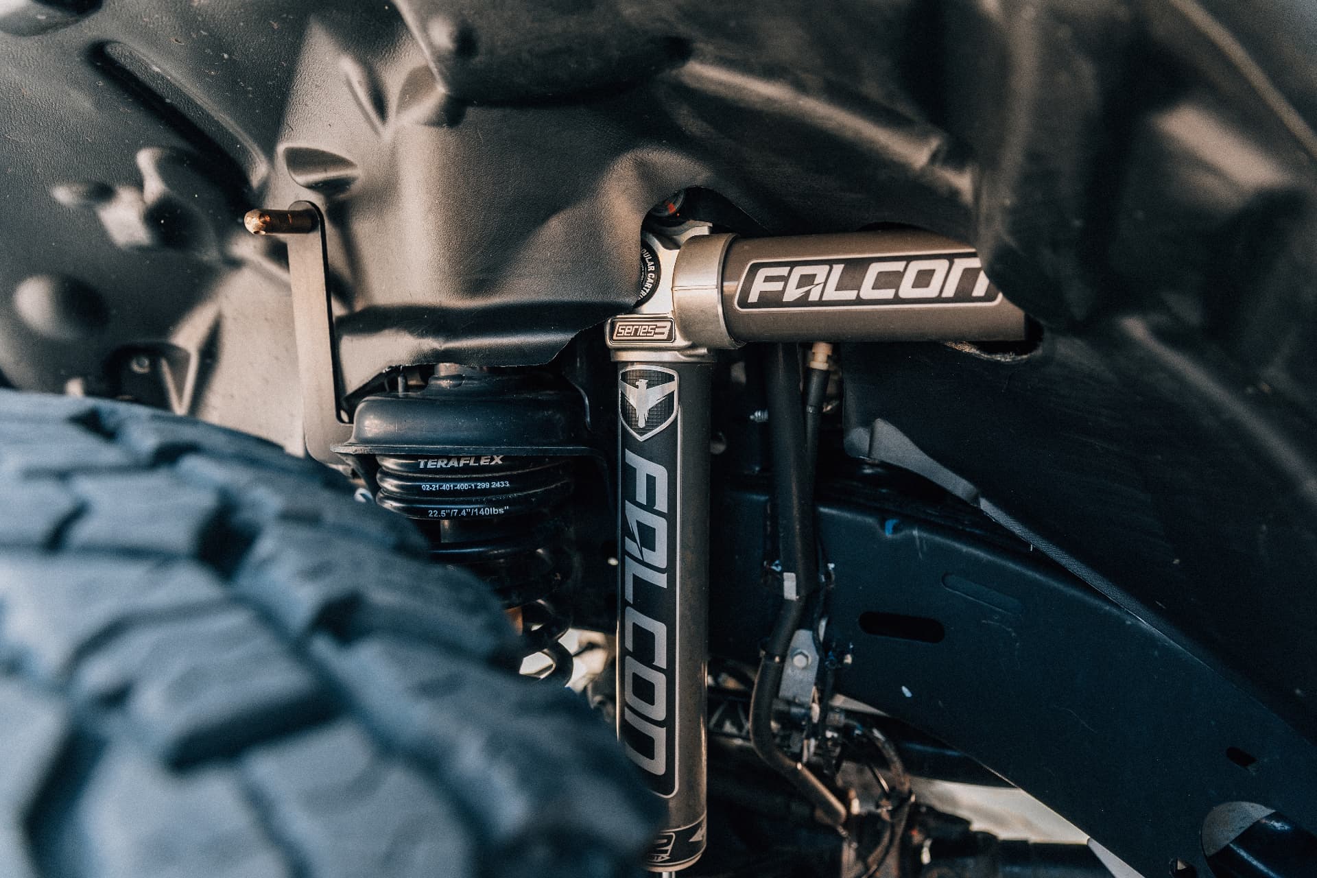 Falcon shock and TeraFlex suspension detail under the Gladiator