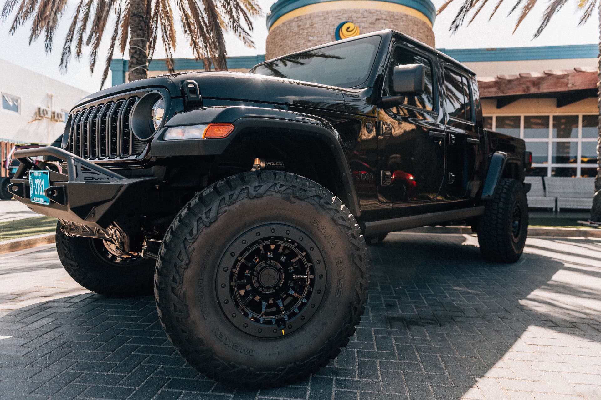 The Beast — DV8 front bumper, Mickey Thompson Baja Boss 37-inch tires on black beadlock-style wheels